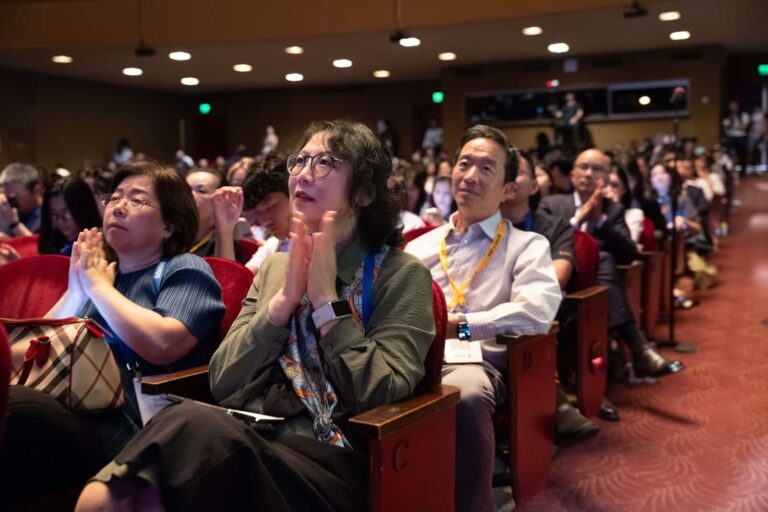 Attendees applaud during a session at the 2026 Frontier Symposium