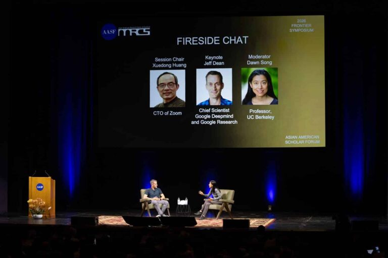 Wide view of the keynote fireside chat with Jeff Dean and moderator Dawn Song at the 2026 Frontier Symposium