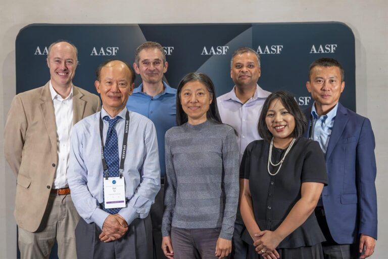 Hosts and participants from a research lunch roundtable at the 2026 Symposium