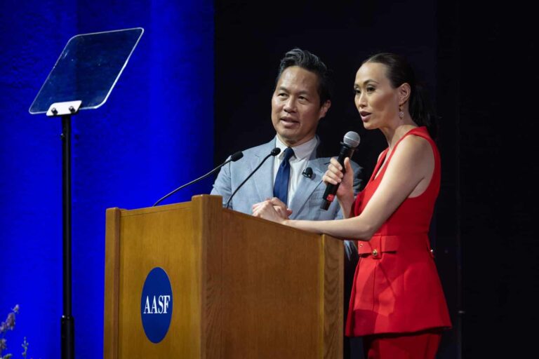 Co-MCs Richard Lui and Gia Vang host the 2026 Asian American Pioneer Medal Ceremony