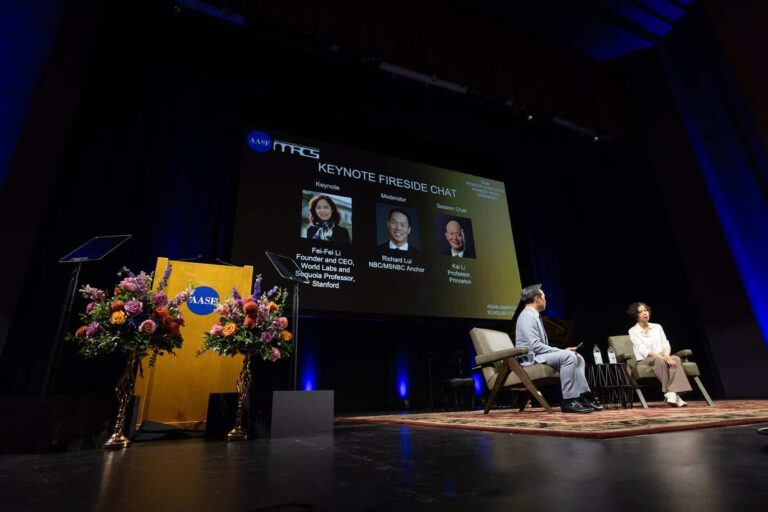 Wide view of the keynote fireside chat with Fei-Fei Li at the 2026 Pioneer Symposium