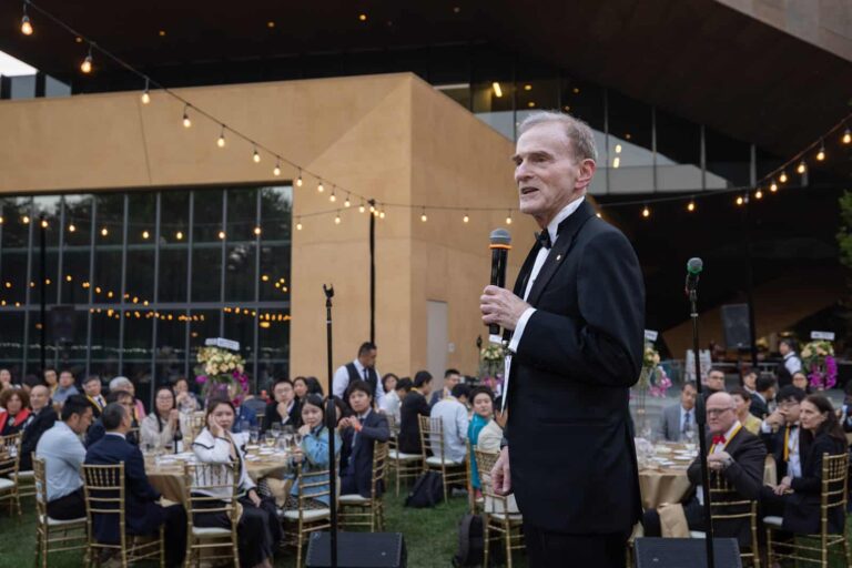 A speaker addresses guests at the Sponsor Gala Dinner at the Cantor Arts Center, Stanford