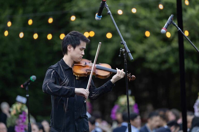 A violinist performs during the 2026 Sponsor Gala Dinner