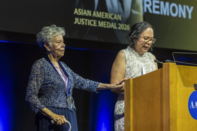 The 2026 Asian American Justice Medal is presented on stage